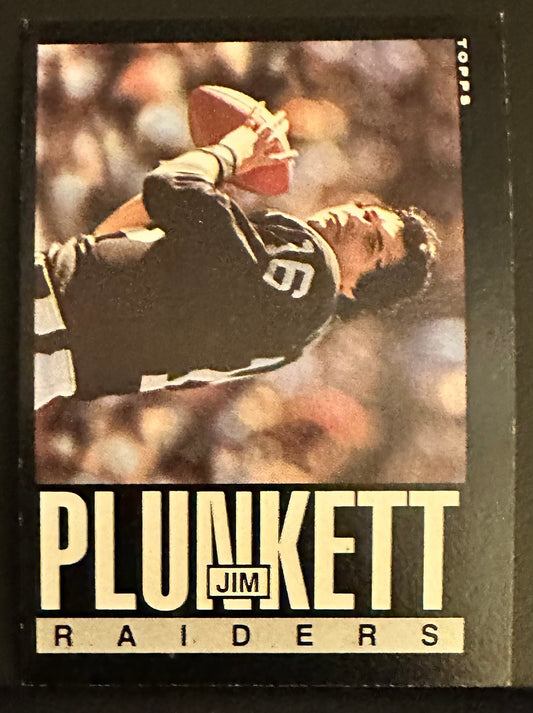 1985 Topps Set-Break # 297 Jim Plunkett - NM-MT